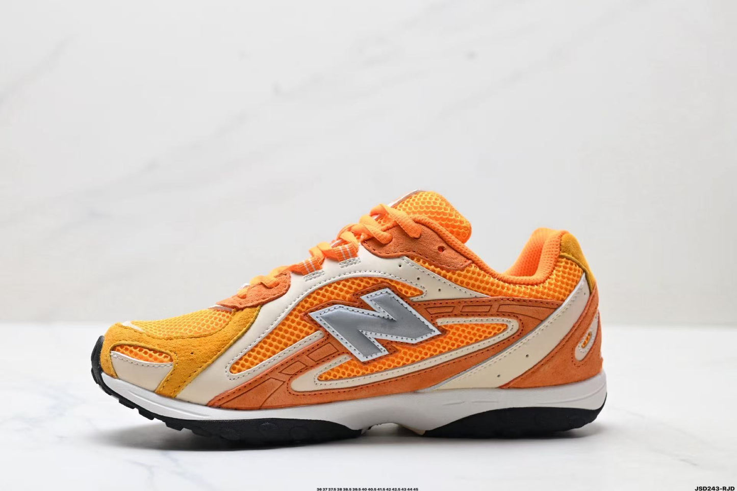 New Balance 204L x KITH Orange