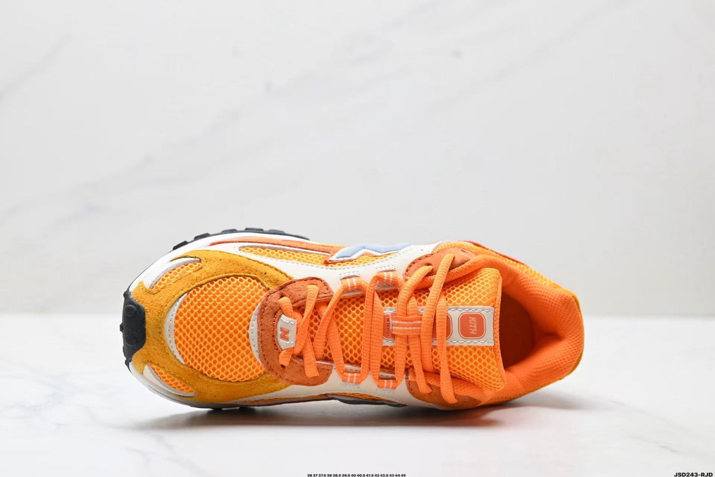 New Balance 204L x KITH Orange